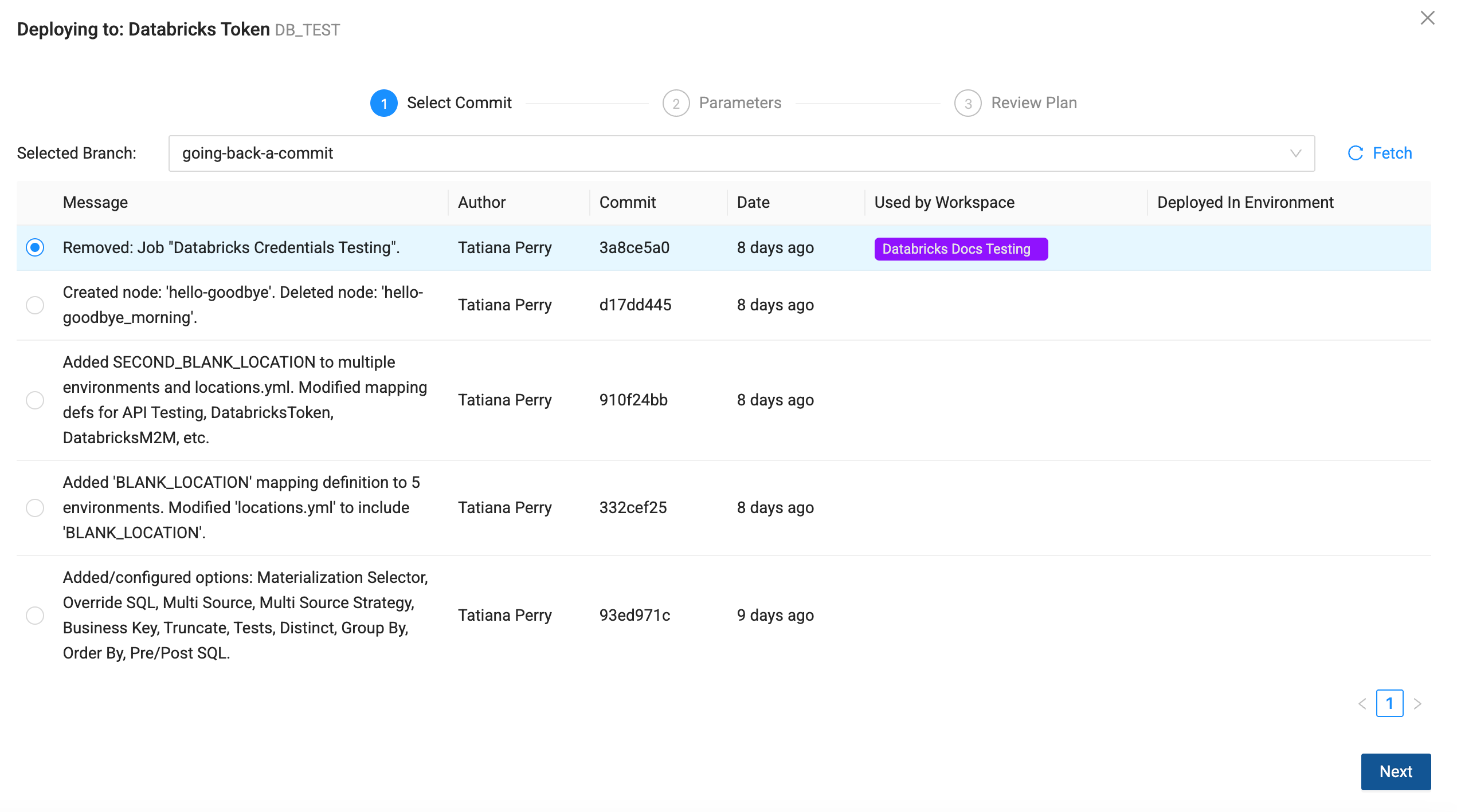 Modal dialog for deploying to Databricks Token DB\_TEST showing step 1 Select Commit with the branch dropdown set to going-back-a-commit and a list of commits by Tatiana Perry, the first commit selected, and a Next button at the bottom.